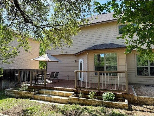 2201 Ezra Ct, Cedar Park, TX 78613 - back of property with a deck and roof with shingles
