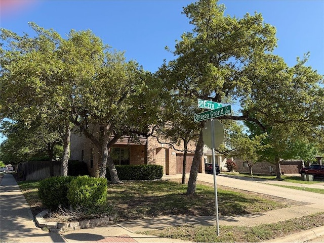 2201 Ezra Ct, Cedar Park, TX 78613 - view of property hidden behind natural elements featuring driveway