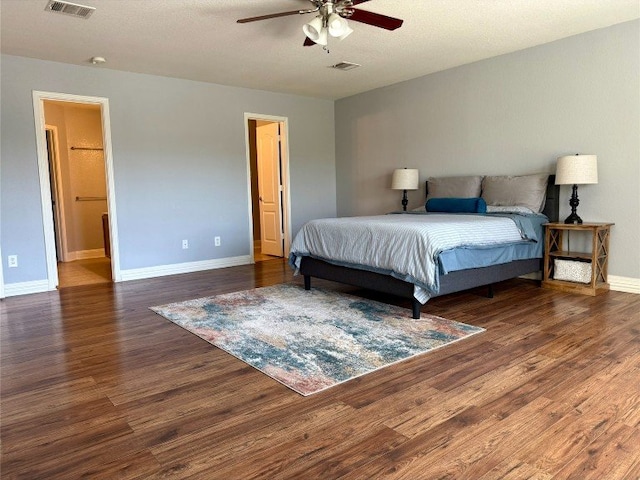 2201 Ezra Ct, Cedar Park, TX 78613 - bedroom with wood finished floors, baseboards, and ceiling fan