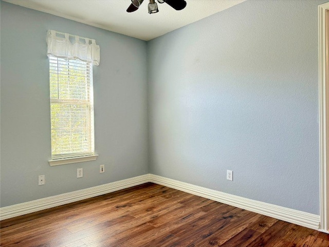 2201 Ezra Ct, Cedar Park, TX 78613 - empty room featuring plenty of natural light, dark wood-style flooring, baseboards, and ceiling fan