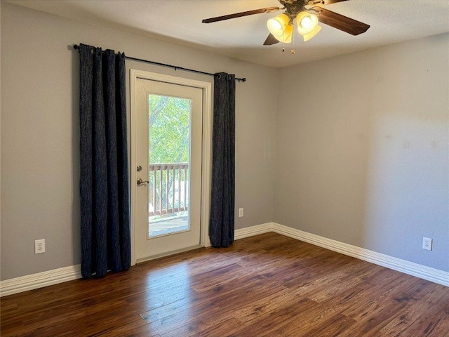 2201 Ezra Ct, Cedar Park, TX 78613 - unfurnished room with a ceiling fan, dark wood-type flooring, and baseboards