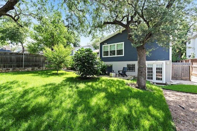 2004 Raleigh Ave, Austin, TX 78703 - fenced backyard with french doors