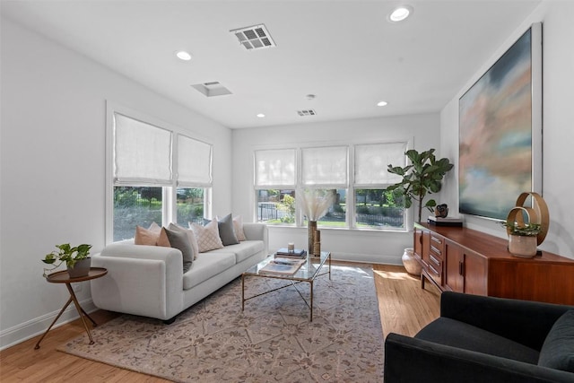 2004 Raleigh Ave, Austin, TX 78703 - living room featuring recessed lighting and wood finished floors