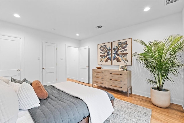 2004 Raleigh Ave, Austin, TX 78703 - bedroom featuring light wood-type flooring and recessed lighting