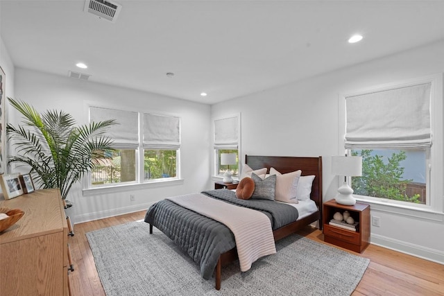 2004 Raleigh Ave, Austin, TX 78703 - bedroom with light wood finished floors and recessed lighting
