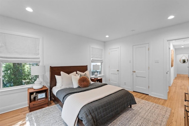 2004 Raleigh Ave, Austin, TX 78703 - bedroom with light wood finished floors and recessed lighting