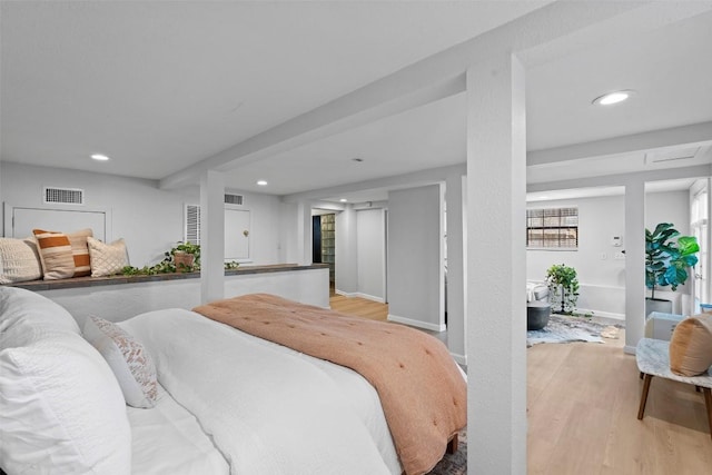 2004 Raleigh Ave, Austin, TX 78703 - bedroom with light wood-style floors and recessed lighting