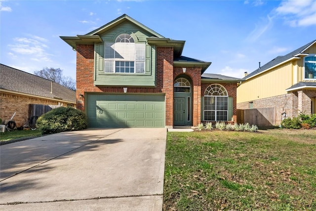 traditional-style house with a front yard, an attached garage, fence, brick siding, and driveway