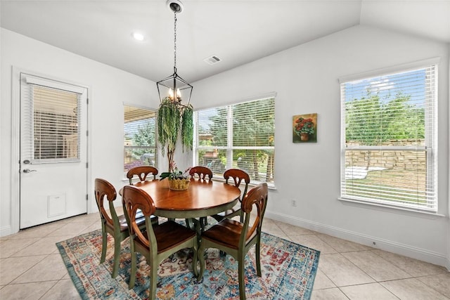 174 Challis Ct, Austin, TX 78737 - dining room with light tile patterned floors, baseboards, and vaulted ceiling