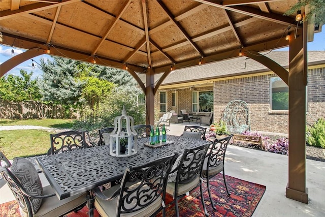 174 Challis Ct, Austin, TX 78737 - view of patio / terrace featuring outdoor dining area and a gazebo