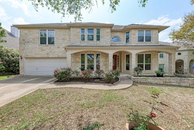 8105 Endeavor Cir, Austin, TX 78726 - view of front of property with stone siding, an attached garage, and concrete driveway