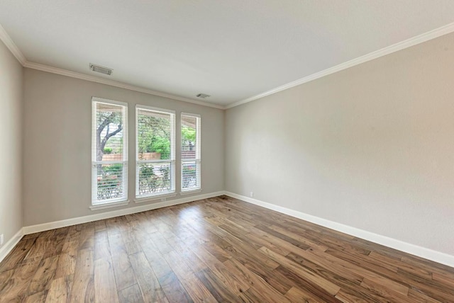 8105 Endeavor Cir, Austin, TX 78726 - empty room featuring wood finished floors and ornamental molding