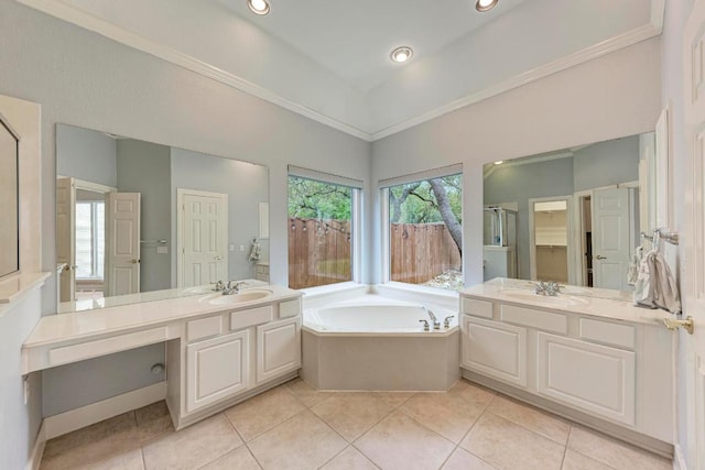 8105 Endeavor Cir, Austin, TX 78726 - full bath featuring a garden tub, two vanities, ornamental molding, tile patterned flooring, and a shower stall
