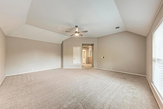 8105 Endeavor Cir, Austin, TX 78726 - empty room with vaulted ceiling, a ceiling fan, carpet, and plenty of natural light