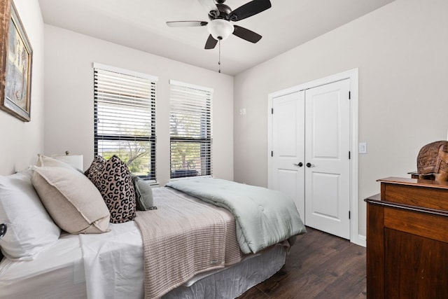 18105 Austin Blvd, Lago Vista, TX 78645 - bedroom with dark wood-style flooring, a closet, and a ceiling fan