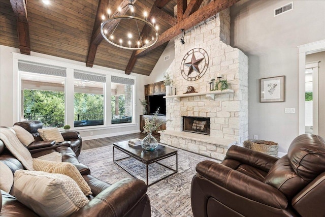 3204 Whitt Creek Trl, Leander, TX 78641 - living area with wooden ceiling with exposed beams, high vaulted ceiling, wood finished floors, a chandelier, and baseboards