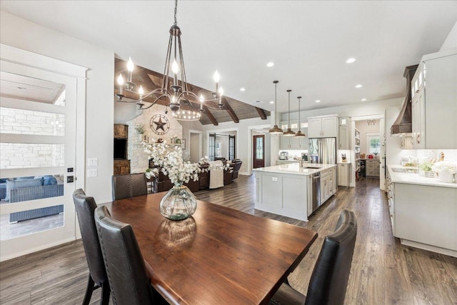 3204 Whitt Creek Trl, Leander, TX 78641 - dining space featuring dark wood finished floors, a chandelier, lofted ceiling, recessed lighting, and baseboards