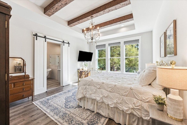 3204 Whitt Creek Trl, Leander, TX 78641 - bedroom with a barn door, wood finished floors, beamed ceiling, a chandelier, and ensuite bath