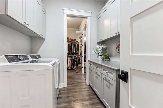 3204 Whitt Creek Trl, Leander, TX 78641 - laundry room featuring cabinet space, independent washer and dryer, and dark wood finished floors