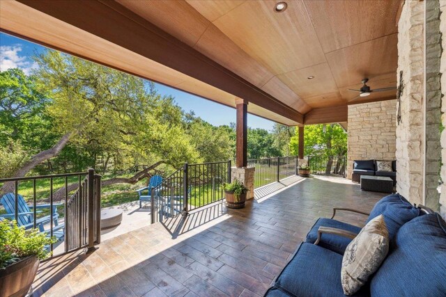 3204 Whitt Creek Trl, Leander, TX 78641 - view of patio with an outdoor stone fireplace and a ceiling fan