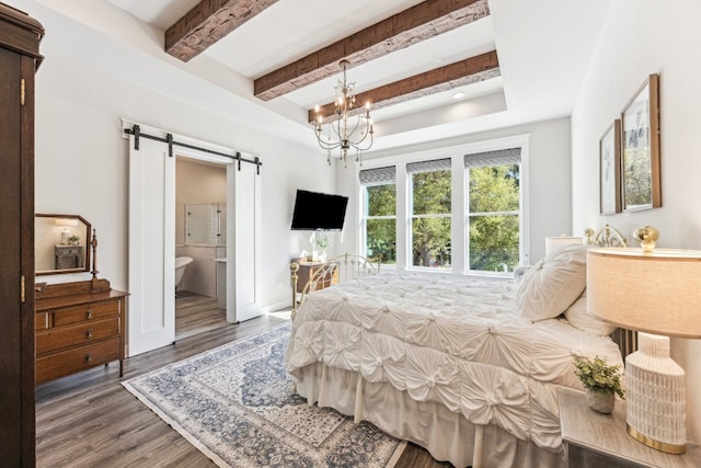 3204 Whitt Creek Trl, Leander, TX 78641 - bedroom with a barn door, wood finished floors, beam ceiling, a chandelier, and ensuite bath