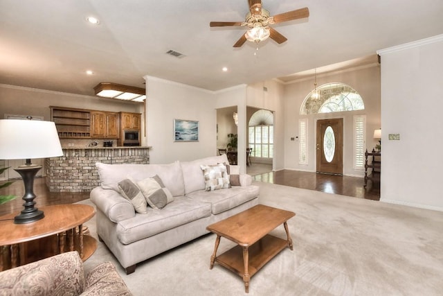 200 Nicole Way, Georgetown, TX 78633 - living area featuring healthy amount of natural light, ceiling fan, crown molding, recessed lighting, and light colored carpet