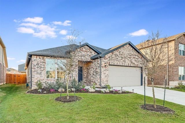 view of front of property with a garage, fence, brick siding, a front lawn, and driveway