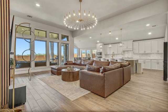 518 Bay Breeze Dr, Kyle, TX 78640 - living room featuring recessed lighting, light wood-type flooring, and visible vents