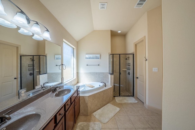 2705 Sixpence Ln, Pflugerville, TX 78660 - bathroom featuring a bath, a shower stall, tile patterned flooring, double vanity, and vaulted ceiling