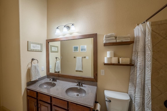 2705 Sixpence Ln, Pflugerville, TX 78660 - full bathroom with toilet, double vanity, and a shower with shower curtain