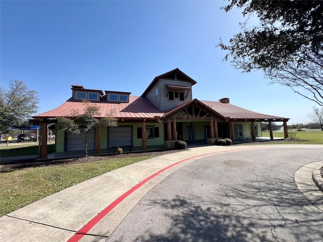 view of front of home featuring a porch and metal roof