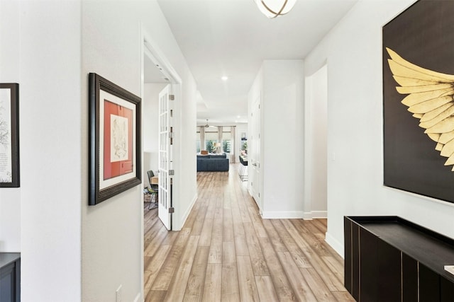 128 Mountain Lion Rd, Georgetown, TX 78628 - corridor with light wood-style floors, baseboards, and recessed lighting