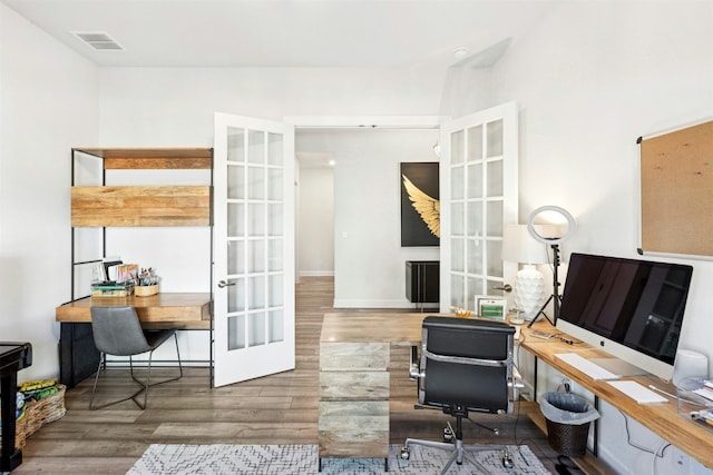 128 Mountain Lion Rd, Georgetown, TX 78628 - office featuring wood finished floors and french doors