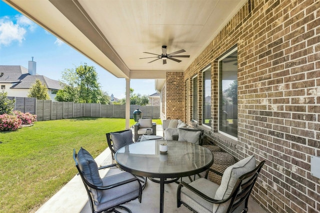128 Mountain Lion Rd, Georgetown, TX 78628 - view of patio / terrace with ceiling fan and outdoor dining space
