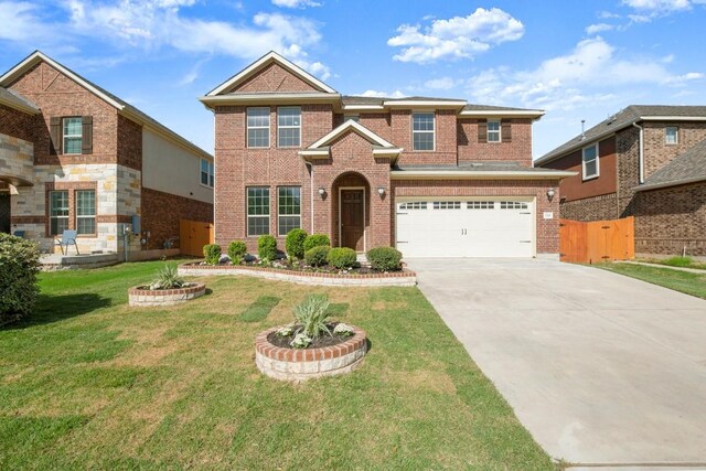 728 Pioneer Grv, Round Rock, TX 78665 - traditional home with driveway, a garage, and brick siding