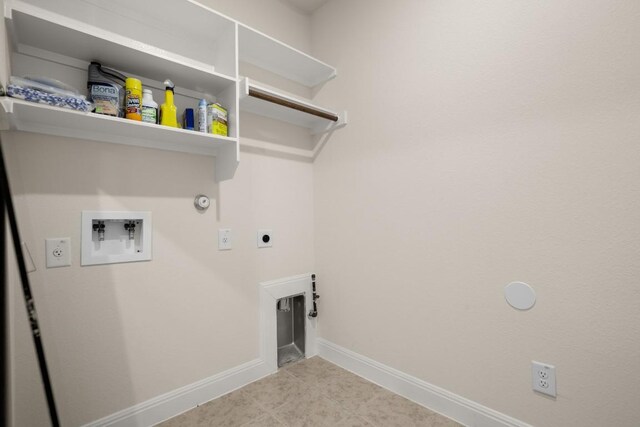 728 Pioneer Grv, Round Rock, TX 78665 - laundry room featuring hookup for a gas dryer, electric dryer hookup, hookup for a washing machine, baseboards, and tile patterned floors