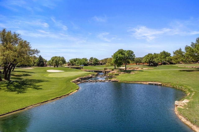 109 Grand Oaks Ln, Georgetown, TX 78628 - surrounding community with a water view, golf course view, and a yard