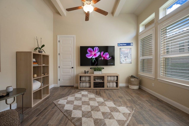 109 Grand Oaks Ln, Georgetown, TX 78628 - living area with beamed ceiling, a ceiling fan, and wood finished floors