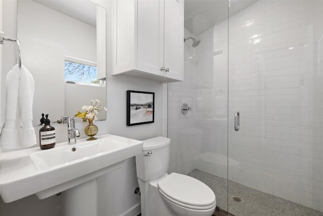1605 Willow St Unit B, Austin, TX 78702 - full bathroom with toilet, a stall shower, and a sink