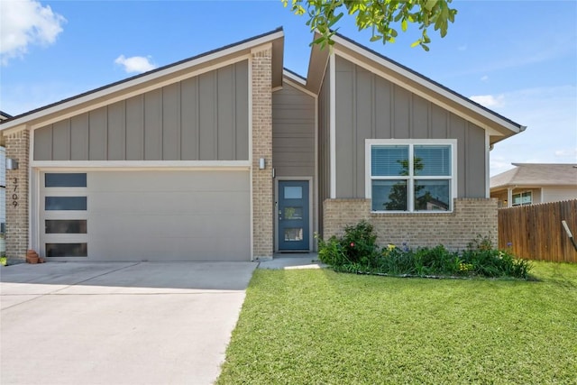 mid-century home featuring brick siding, board and batten siding, fence, and an attached garage