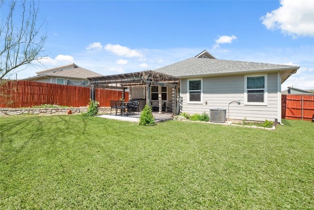 back of house with a fenced backyard, cooling unit, a yard, and a pergola