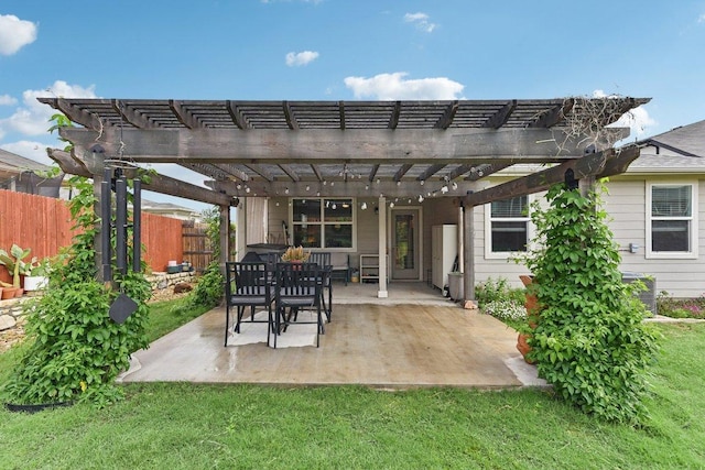 back of property with a yard, fence, a patio, cooling unit, and a pergola