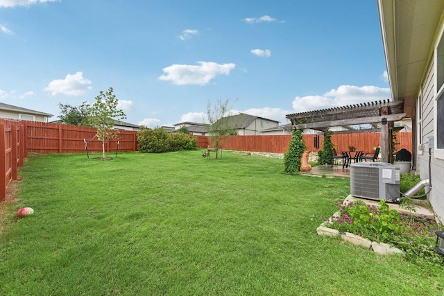view of yard with a pergola, a patio, a fenced backyard, and central AC unit