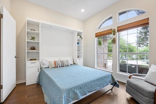 7306 Holly Fern Cv, Austin, TX 78750 - bedroom with dark wood-style floors and recessed lighting