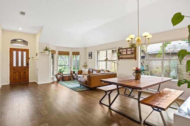 7306 Holly Fern Cv, Austin, TX 78750 - dining area featuring wood finished floors and a chandelier
