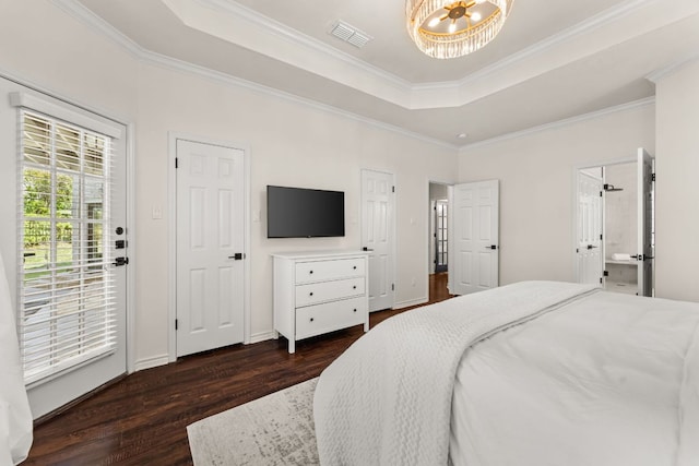 6 Dovedale Cv, The Hills, TX 78738 - bedroom featuring dark wood-style flooring, crown molding, a raised ceiling, access to exterior, and a chandelier