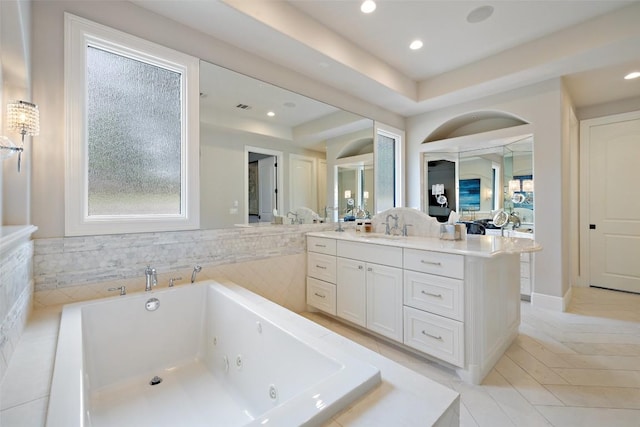 212 Bella Cima Dr, Austin, TX 78734 - bathroom featuring vanity, a tub with jets, and recessed lighting
