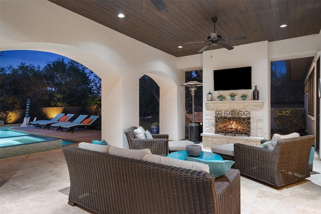 212 Bella Cima Dr, Austin, TX 78734 - view of patio with an outdoor living space with a fireplace and a ceiling fan