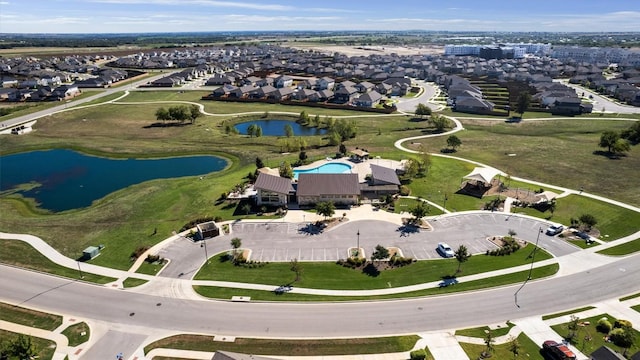 aerial view with a water view and a residential view