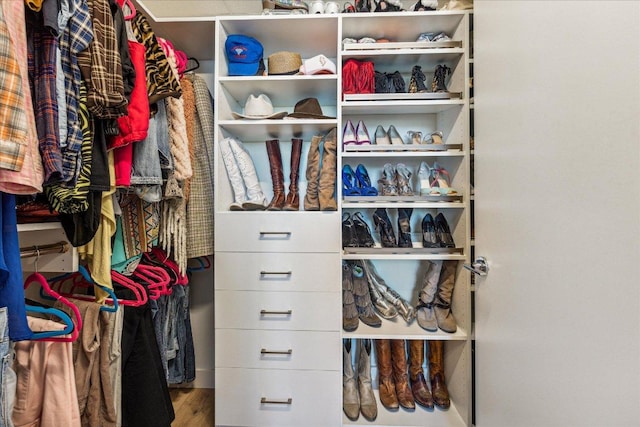 44 E Ave Unit 2509, Austin, TX 78701 - walk in closet with wood finished floors